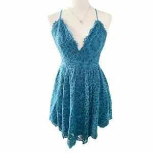 NBD Lace Criss cross back mini dress with pockets